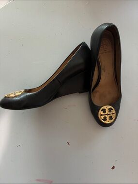 Tory Burch Black Leather Wedge Heels with Gold Logo Emblem